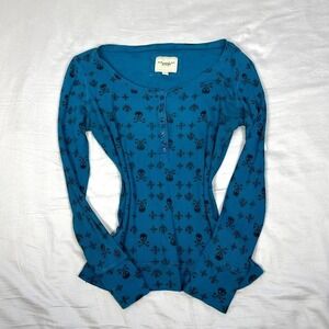 Vintage y2k Energie blue long sleeve henley top with black skulls design